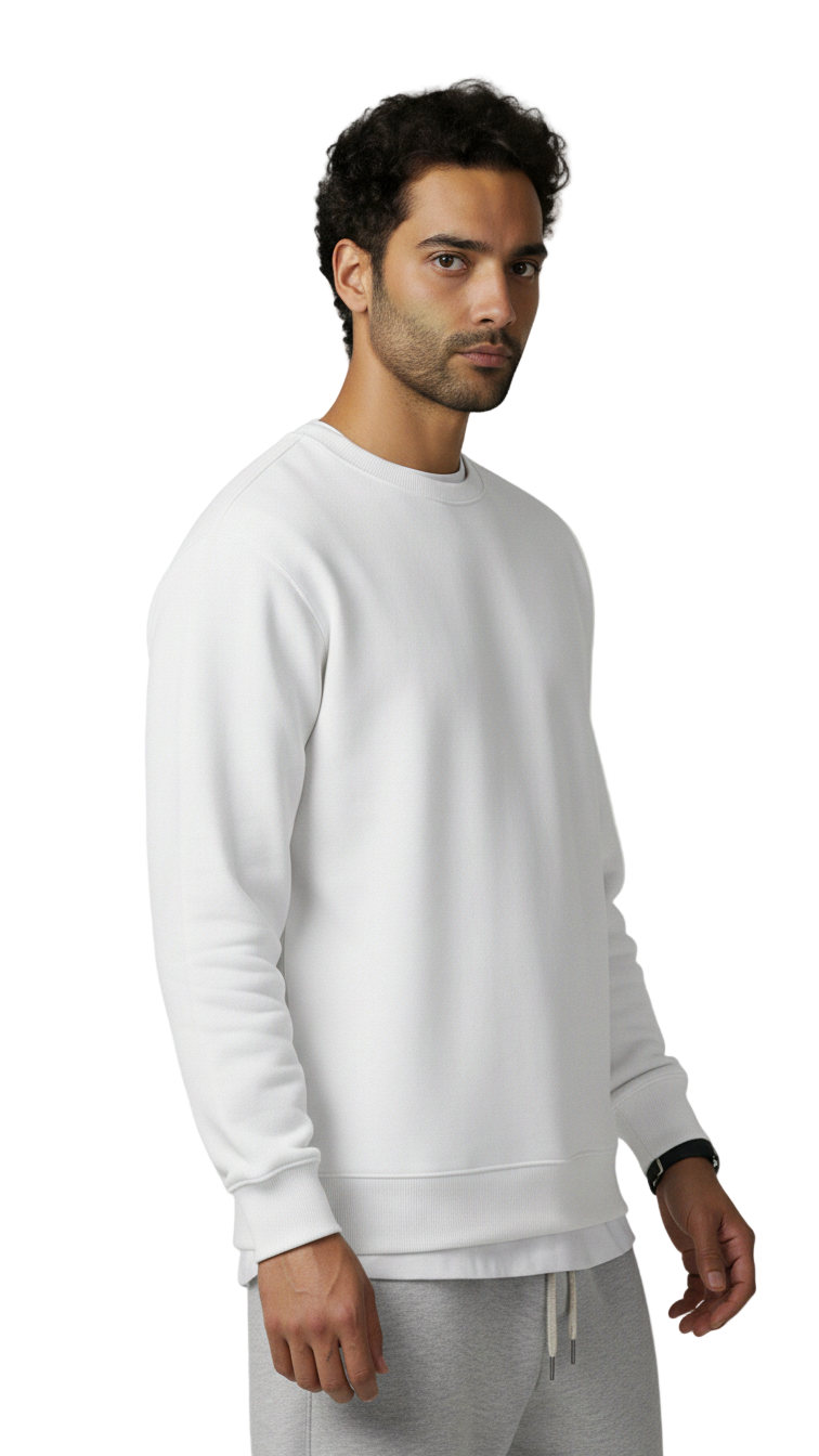 Man wearing a white sweatshirt and gray pants on a light gray background